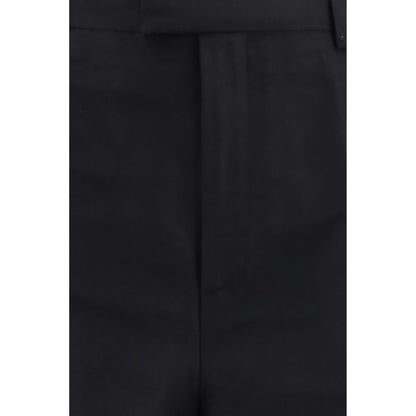 Trousers by Gucci for women in silk black features an sartorial silhouette, showcasing a precise regular-fit and long with a sartorial for a refined look.