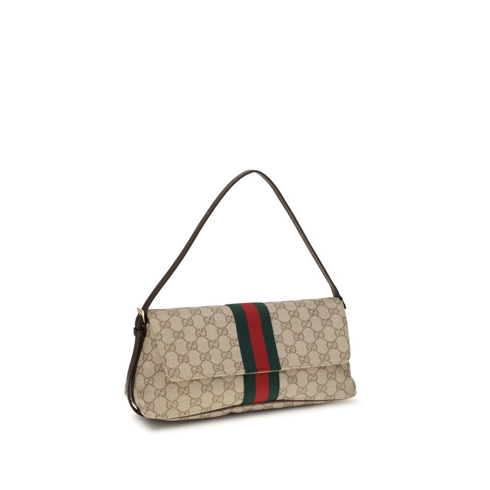 Medium Shoulder Handbag by Gucci for women in cotton & leather beige, brown, signature & striped features a signature silhouette, showcasing a secure snap, zipper & magnetic and signature with versatile shoulder-strap & adjustable-strap for a sophisticated look.