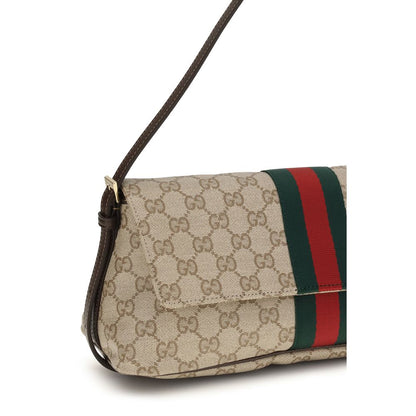 Medium Shoulder Handbag by Gucci for women in cotton & leather beige, brown, signature & striped features an refined silhouette, showcasing a secure snap, zipper & magnetic, ample , and versatile shoulder-strap & adjustable-strap for a sophisticated refined aesthetic.
