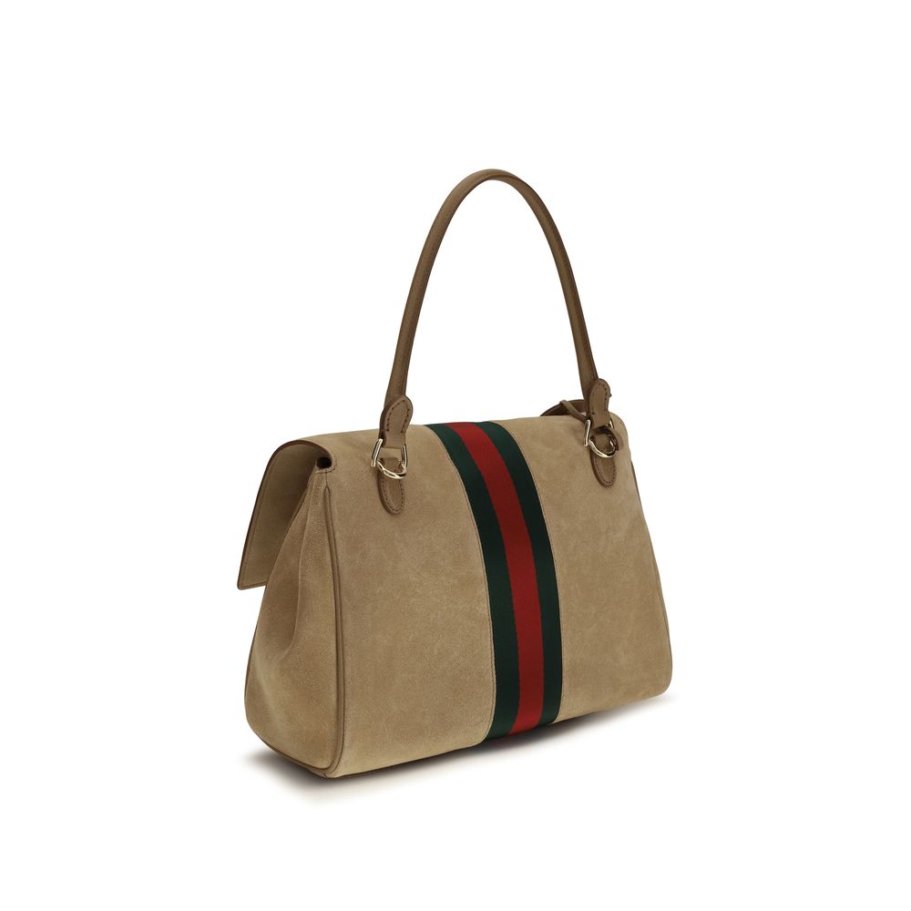 Medium Handbag by Gucci for women in bos taurus calf suede leather beige, green, red & striped features a exquisite silhouette, showcasing a secure snap, zipper, magnetic & button and exquisite with versatile shoulder-strap & adjustable-strap for a exquisite finish.