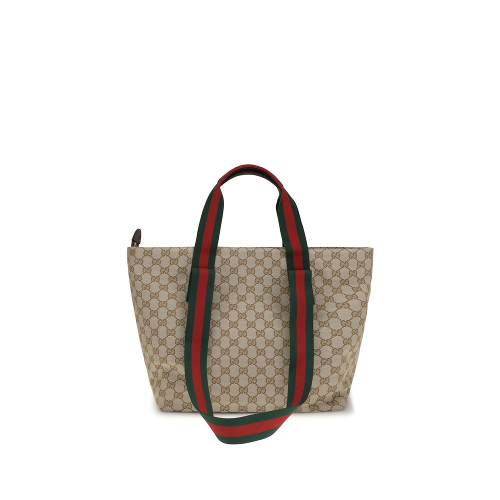 Small Tote Shoulder Bag by Gucci for men in polyester leather cotton canvas beige, brown, green, red, patterned, signature, print & striped features a effortless chic silhouette with a secure zipper, ample , and versatile handle for a effortless chic finish.