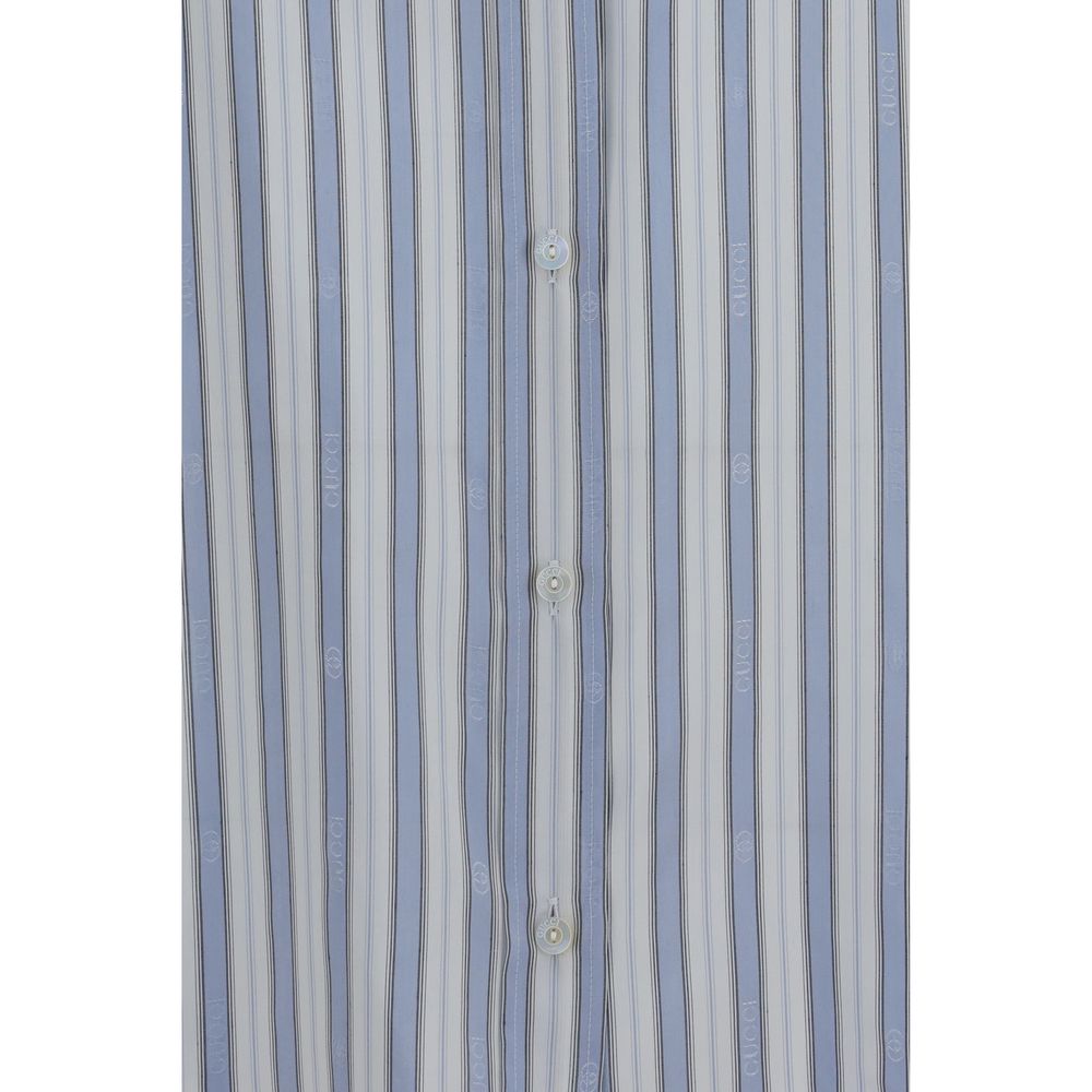 Shirt by Gucci for women in silk light-blue, white, patterned, jacquard & striped presents a discerning silhouette, showcasing a sophisticated and for a truly discerning finish.