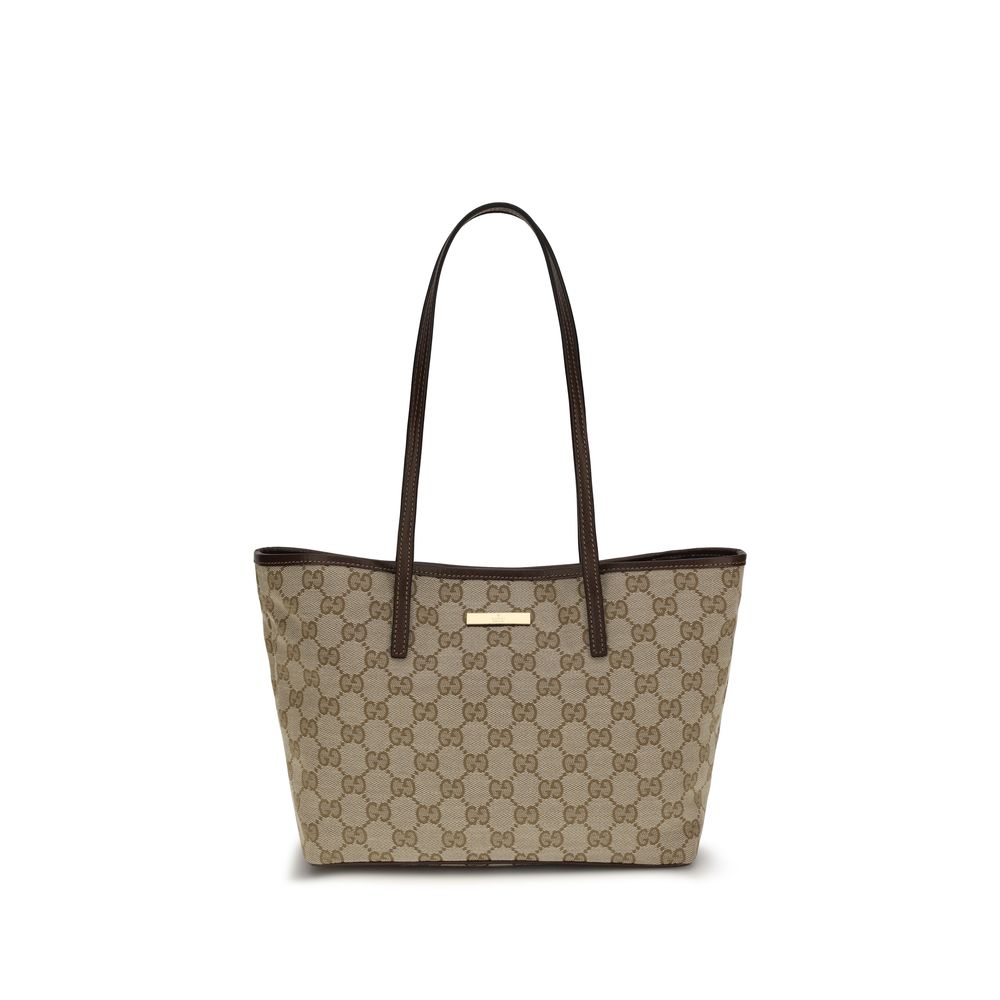 Large Tote Handbag by Gucci for women in leather beige features a contemporary silhouette, showcasing a secure snap & button, ample , and contemporary for a sophisticated look.