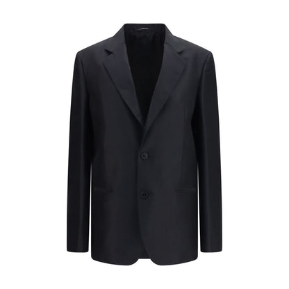 Jacket by Gucci for women in silk black presents a impeccable silhouette, showcasing distinct pockets and a impeccable for a sophisticated finish.