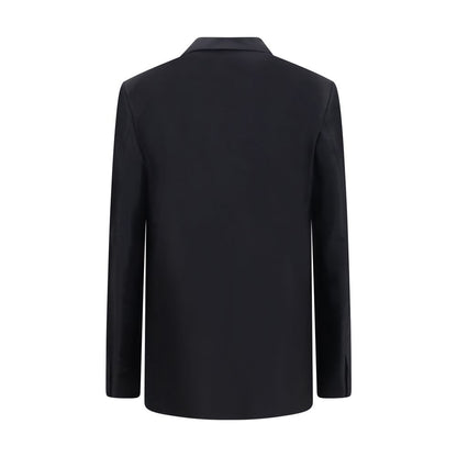 Jacket by Gucci for women in silk black presents a authentic silhouette, artfully detailed with a authentic and functional pockets for a premium authentic finish.