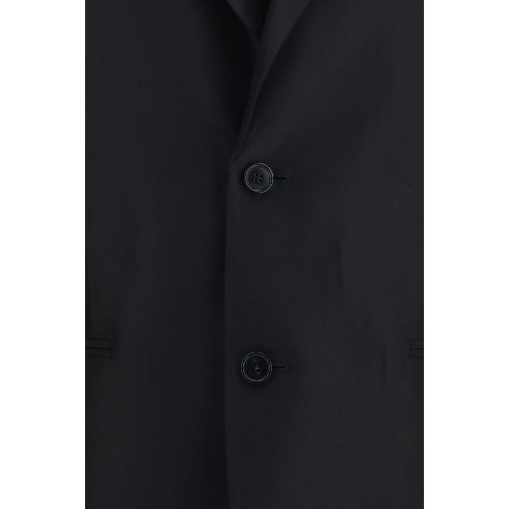 Jacket by Gucci for women in silk black features a smart silhouette, perfectly accentuated by its unique and functional pockets for a smart finish.