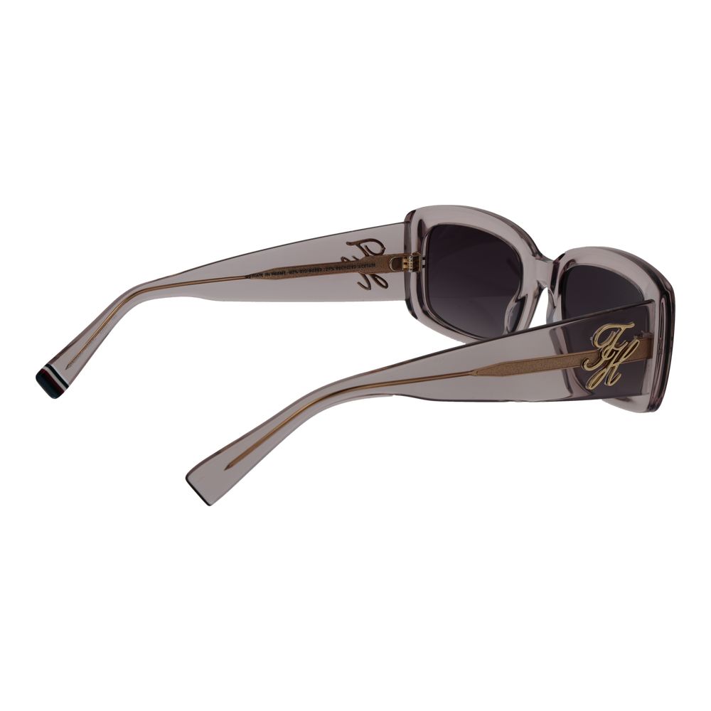 Sunglasses by Tommy Hilfiger for women in acetate and pink presents a sumptuous silhouette, featuring rose coloured frame and rectangle full-rim frame design with gradient category-3-dark-tint lens for a sumptuous look.