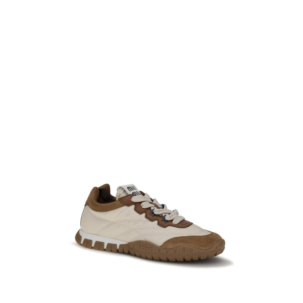 Athletic Sneakers by Miu Miu for women in eva polyamide & bos taurus suede calf leather beige showcases a architectural silhouette, artfully capturing the essence of the Star Women's Athletic EVA Polyamide & Bos Taurus Suede Calf Leather Sneakers with its signature architectural athletic style construction.