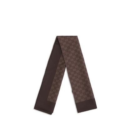 Scarf by Gucci for women in silk twill brown, patterned & jacquard features a snug silhouette, perfectly showcasing the elegant drape and premium finish of the Gg Silk Twill Foulard Scarf.