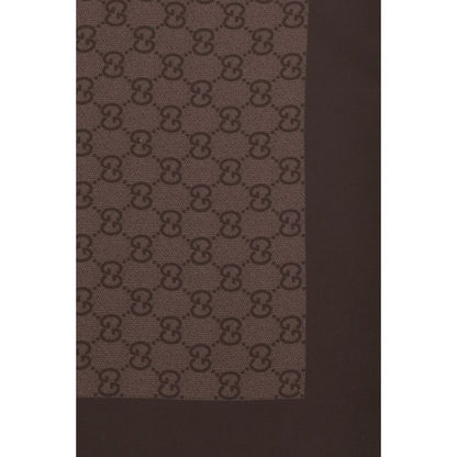 Scarf by Gucci for women in silk twill brown, patterned & jacquard features a timeless silhouette, artfully capturing the essence of the timeless Gg Silk Twill Foulard Scarf design for a sophisticated look.
