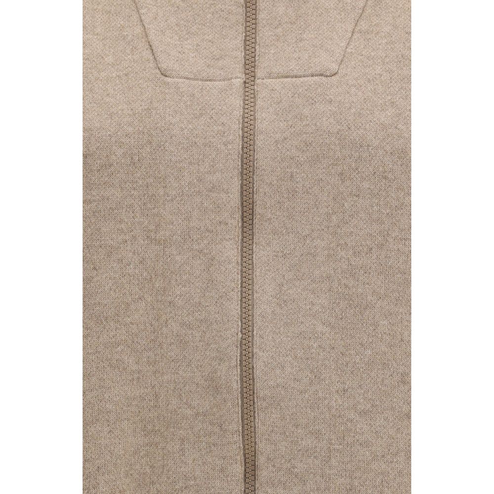 Cardigan by Brunello Cucinelli for women in polyamide cashmere & capra leather beige features an impeccable silhouette, showcasing a sophisticated and detail for a truly impeccable finish.