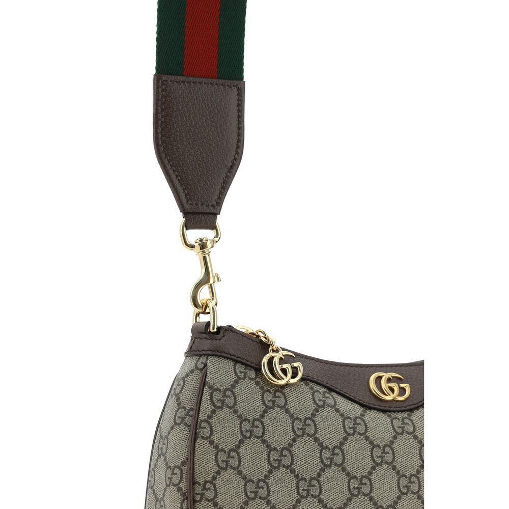 Shoulder Bag by Gucci for women in polyester polyurethane leather & cotton brown, gold & patterned presents a versatile silhouette, showcasing a secure and versatile with versatile shoulder-strap & adjustable-strap for a sophisticated look.