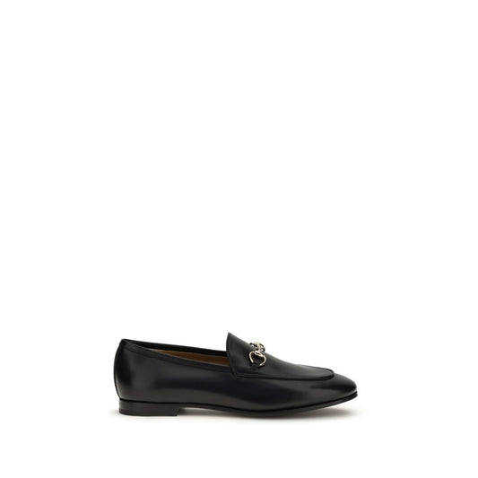 Flat Loafer Slip-On Shoes by Gucci for women in bos taurus calf leather black & gold showcases a timeless silhouette from the Horsebit Women's Bos Taurus Calf Leather Flat Loafer Slip-On Shoes collection, featuring a timeless flat and for a timeless finish.