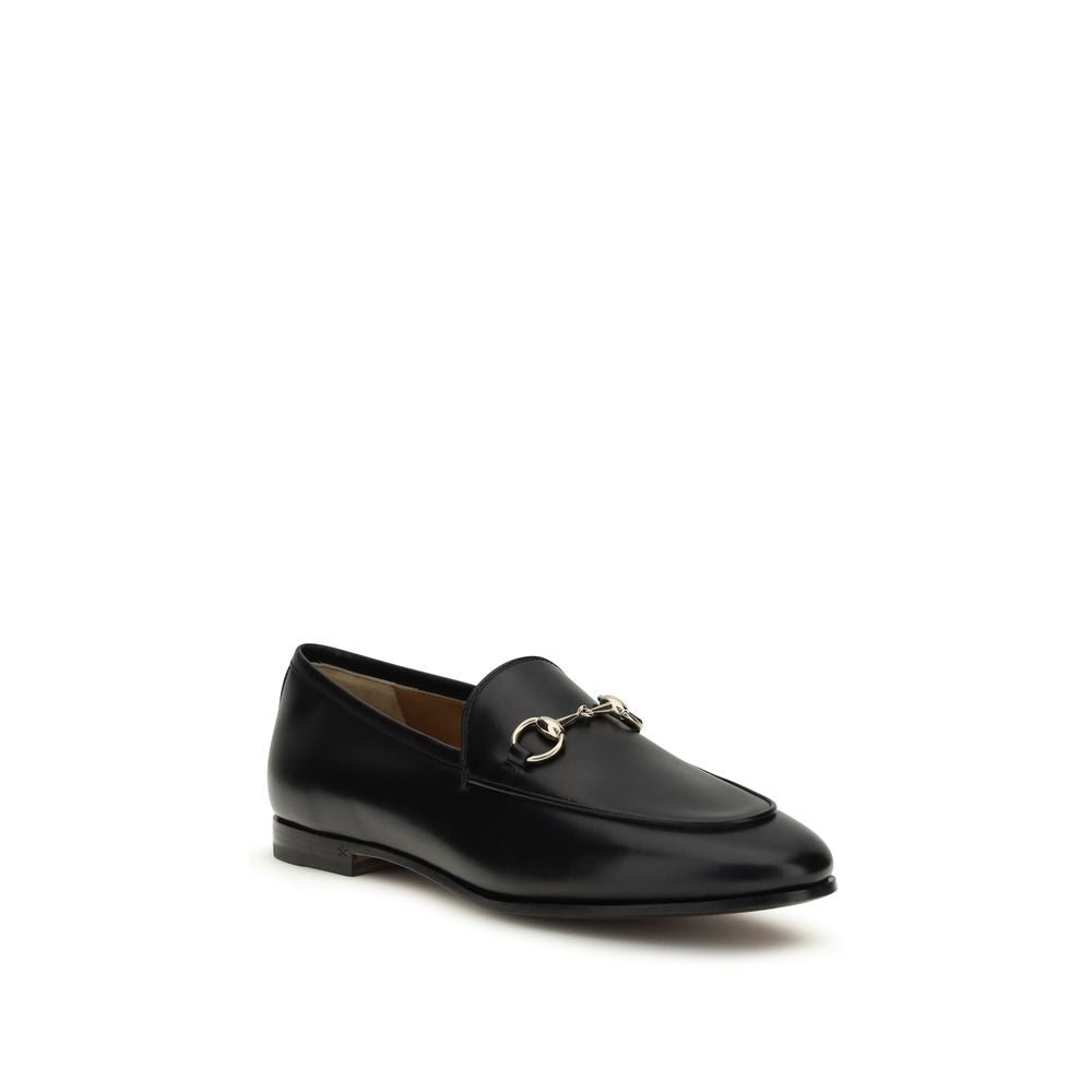 Flat Loafer Slip-On Shoes by Gucci for women in bos taurus calf leather black & gold showcases a impeccable silhouette as Horsebit Women's Bos Taurus Calf Leather Flat Loafer Slip-On Shoes, artfully designed with a impeccable flat and refined for a impeccable finish.