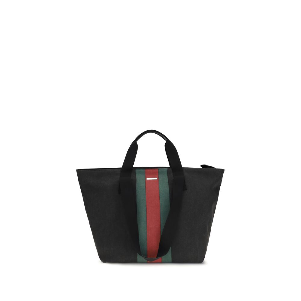 Tote Shoulder Bag by Gucci for men in cotton black & striped features a enviable silhouette, showcasing a secure snap & button, ample , and enviable handle for a enviable finish.