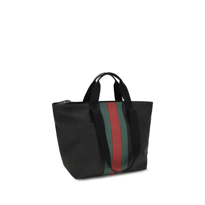 Tote Shoulder Bag by Gucci for men in cotton black & striped features a effortless sophistication silhouette, secured by a snap & button with ample and versatile handle for a effortless sophistication finish.