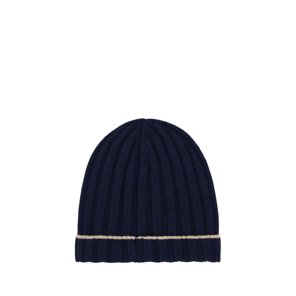 Beanie Hat by Brunello Cucinelli for men in cashmere & capra leather blue features a distinguished knit construction, showcasing the sophisticated silhouette and distinguished finish of the Cashmere & Capra Leather Beanie Hat.