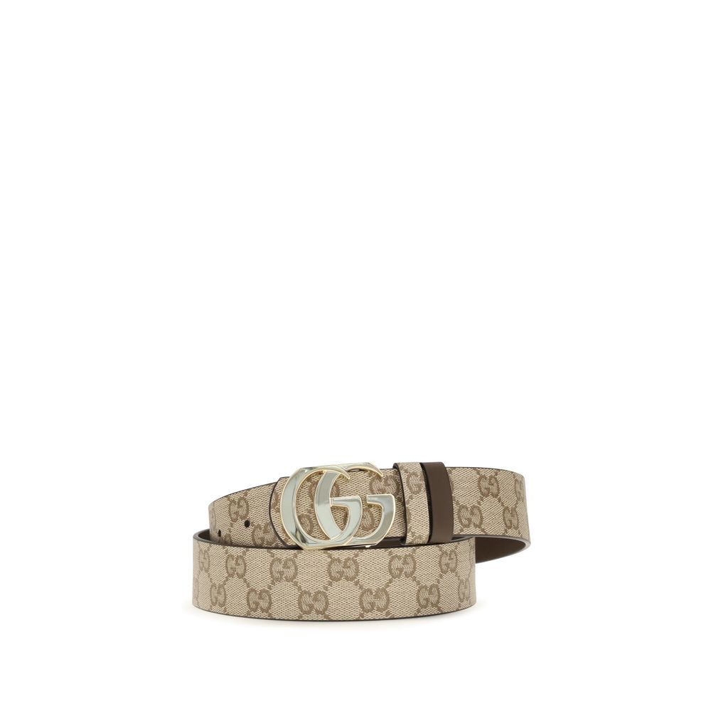 Belt by Gucci for men in bos taurus calf leather beige & gold features an artisanal finish, elegantly showcasing the signature style and artisanal craftsmanship of the Gg Marmont Bos Taurus Calf Leather Belt design.