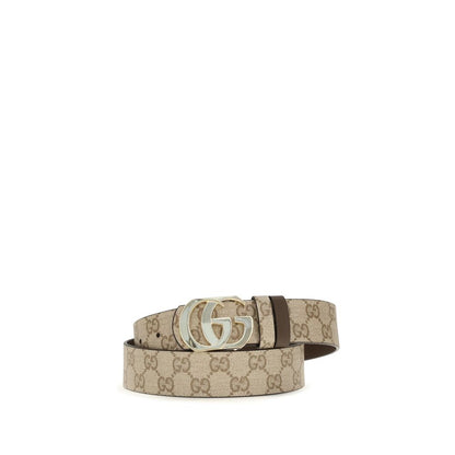 Belt by Gucci for men in bos taurus calf leather beige & gold features an artisanal finish, elegantly showcasing the signature style and artisanal craftsmanship of the Gg Marmont Bos Taurus Calf Leather Belt design.
