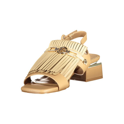 Low-Heel Ankle Strap Sandals by Laura Biagiotti for women in polyurethane and beige presents a sculptural silhouette, showcasing the signature style of the Women's Polyurethane Low-Heel Ankle Strap Sandals with a sculptural 3-cm-heel low-heel and sculptural .