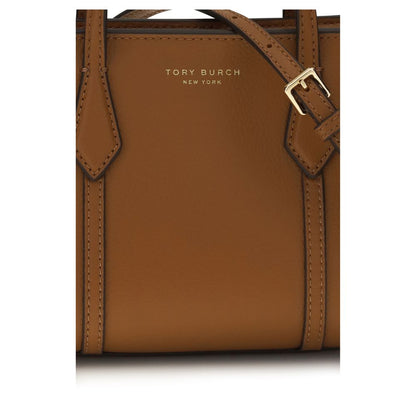 Mini Tote Shoulder Bag by Tory Burch for women in bos taurus calf leather brown presents a versatile silhouette, showcasing a secure zipper and versatile with versatile shoulder-strap & handle for a sophisticated look.