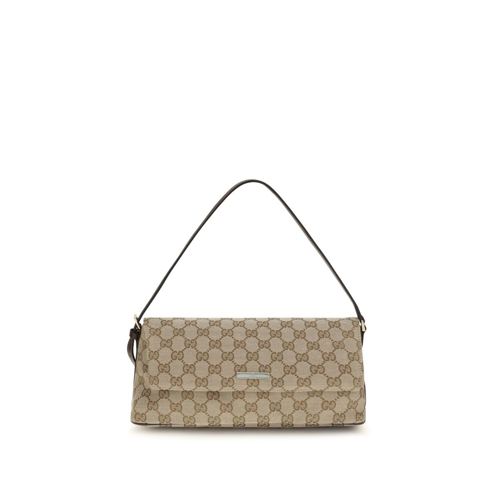 Medium Shoulder Handbag by Gucci for women in leather blue, brown, gold & patterned features an refined silhouette, showcasing a secure snap, zipper & magnetic, ample , and versatile shoulder-strap & adjustable-strap for a sophisticated refined aesthetic.