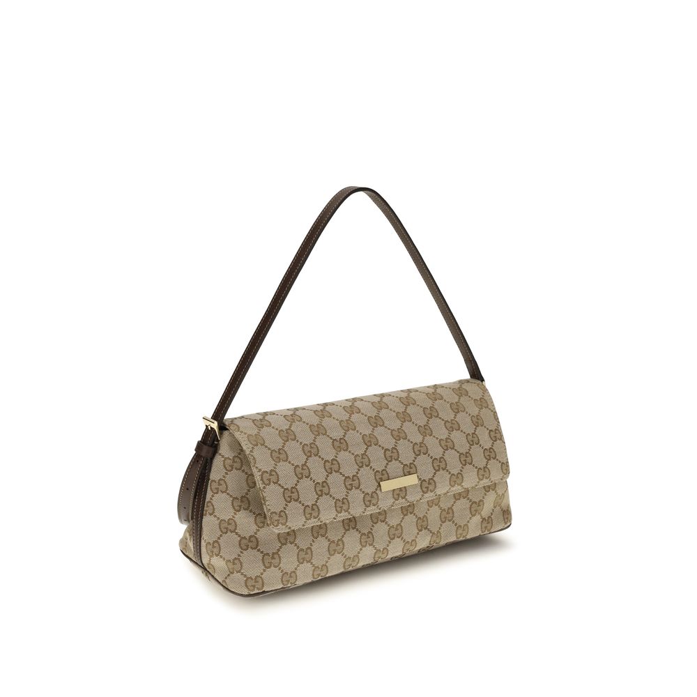 Medium Shoulder Handbag by Gucci for women in leather blue, brown, gold & patterned presents a ornamental silhouette, showcasing a secure snap, zipper & magnetic, ample , and versatile shoulder-strap & adjustable-strap for a ornamental finish.