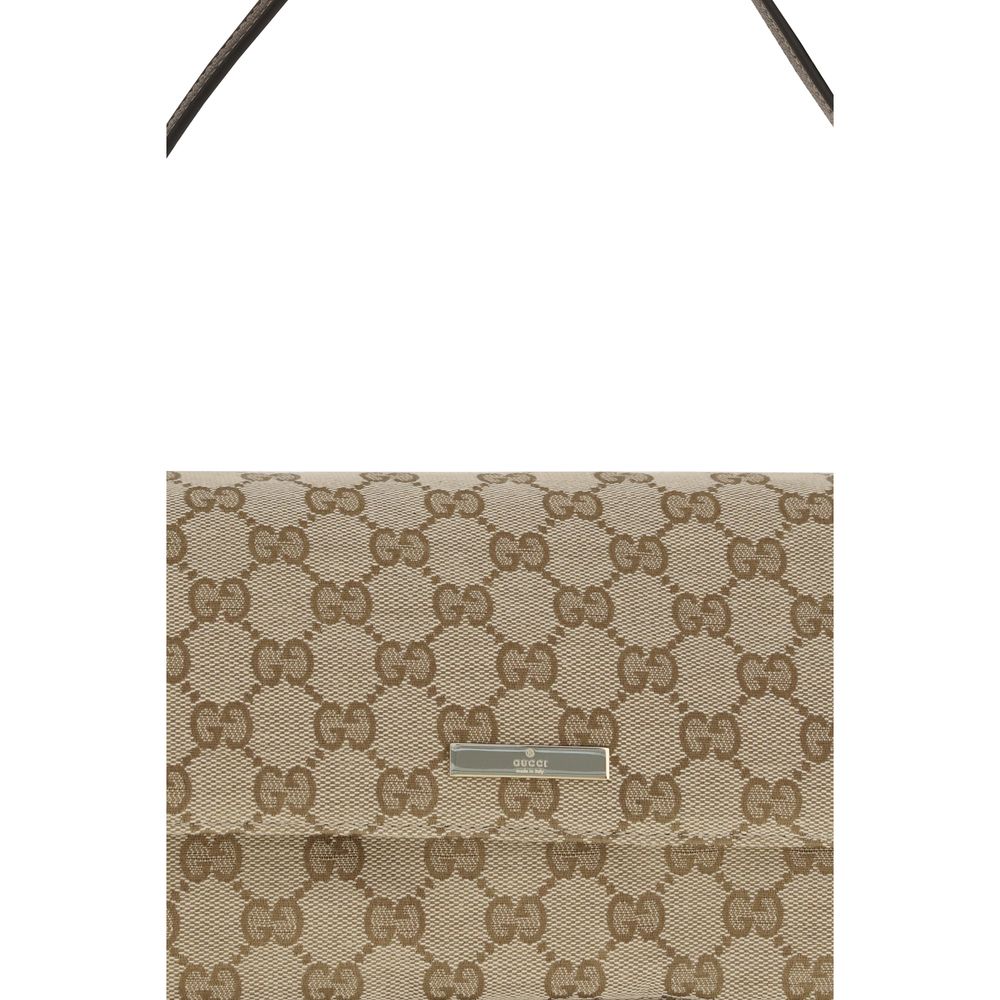 Medium Shoulder Handbag by Gucci for women in leather blue, brown, gold & patterned features a signature silhouette, showcasing a secure snap, zipper & magnetic and signature with versatile shoulder-strap & adjustable-strap for a sophisticated look.