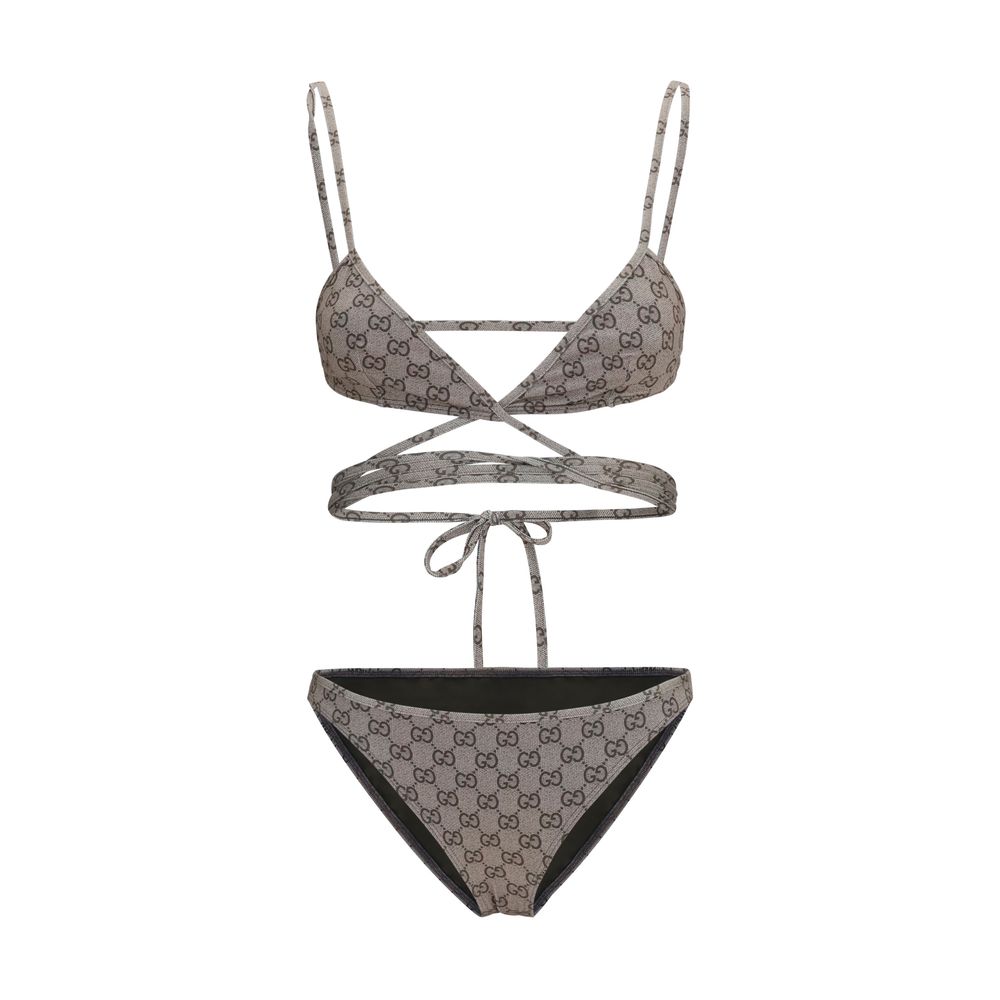 Bikini by Gucci for women in stretch polyester and beige & print presents a sultry silhouette, artfully capturing the sophisticated aesthetic of Gg Women's Stretch Polyester Bikini with a sultry finish.