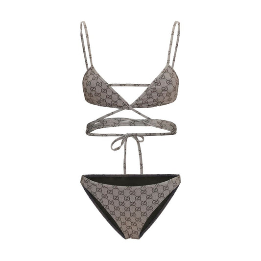 Bikini by Gucci for women in stretch polyester and beige & print presents a sultry silhouette, artfully capturing the sophisticated aesthetic of Gg Women's Stretch Polyester Bikini with a sultry finish.