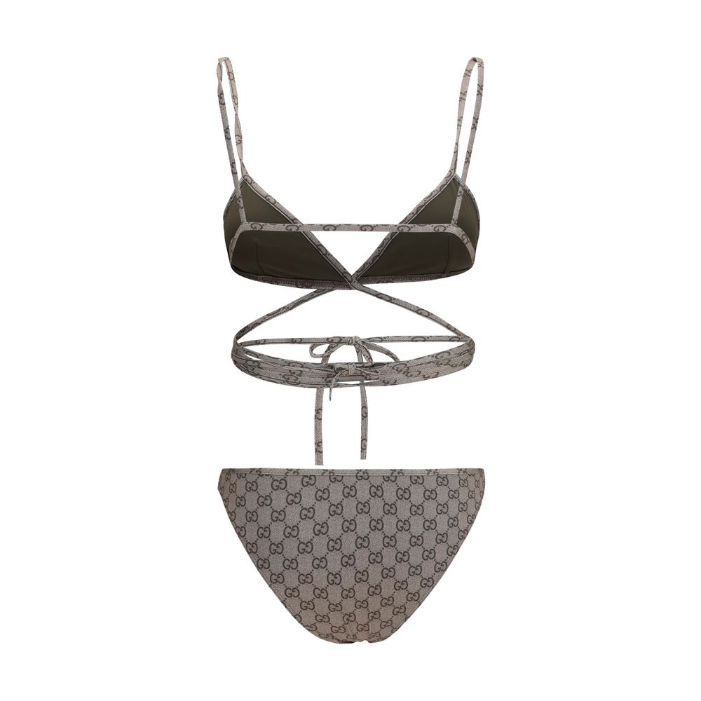 Bikini by Gucci for women in stretch polyester beige & print presents a provocative silhouette, artfully capturing the essence of the provocative Gg Women's Stretch Polyester Bikini design for a sophisticated look.