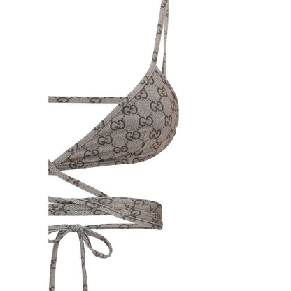 Bikini by Gucci for women in stretch polyester beige & print features an riviera chic silhouette that beautifully encapsulates the signature aesthetic of the Gg Women's Stretch Polyester Bikini.