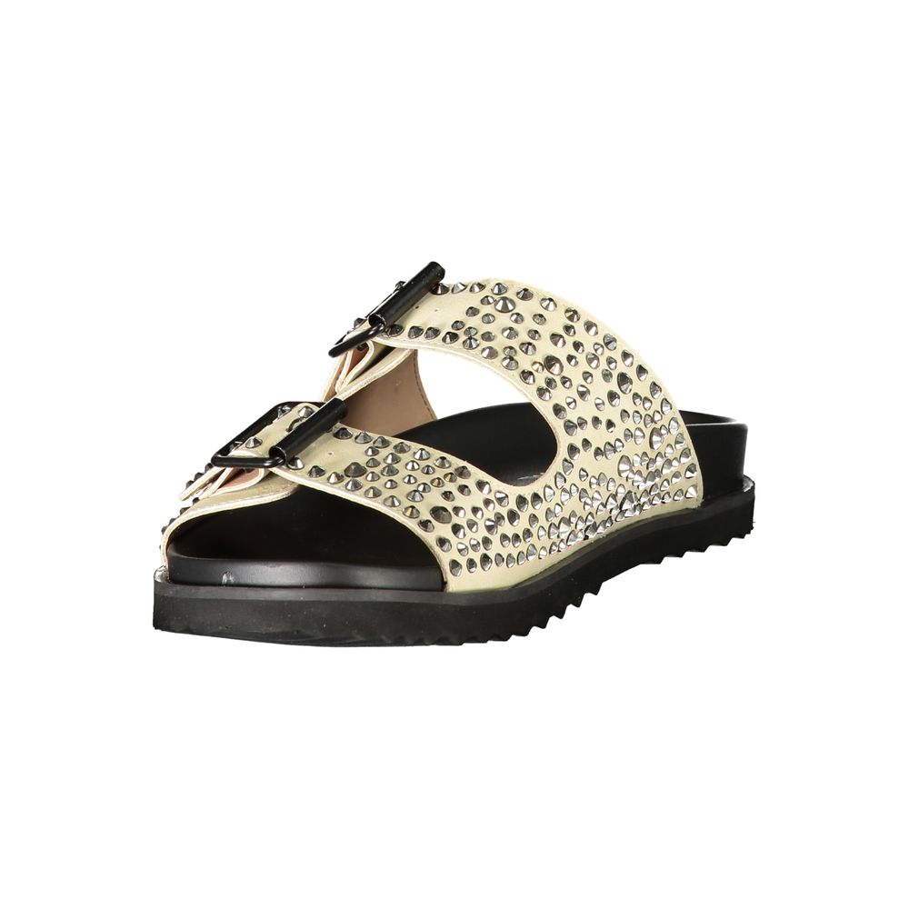 Flat Slider Sandals by Laura Biagiotti for women in polyurethane & rhinestone and beige presents a sculptural silhouette, showcasing the signature style of the Women's Polyurethane & Rhinestone Flat Slider Sandals with a sculptural flat and sculptural .