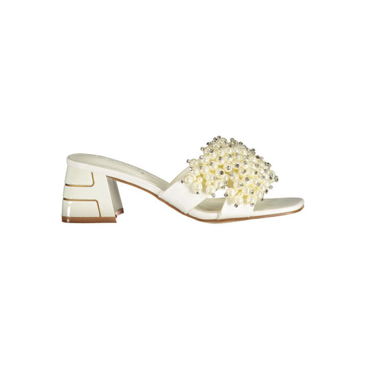 Mid-Heel Sandals by Laura Biagiotti for women in polyurethane & rhinestone and pearl & white presents a sculptural silhouette, showcasing the signature style of the Women's Polyurethane & Rhinestone Mid-Heel Sandals with a sculptural 5-cm-heel mid-heel and sculptural .