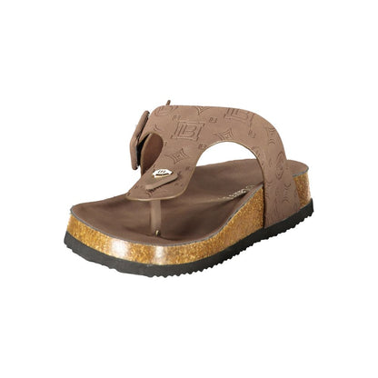 Flat Flip-Flop Sandals by Laura Biagiotti for women in polyurethane brown features an architectural design from the Women's Polyurethane Flat Flip-Flop Sandals collection, defined by a architectural flat and for a architectural finish.
