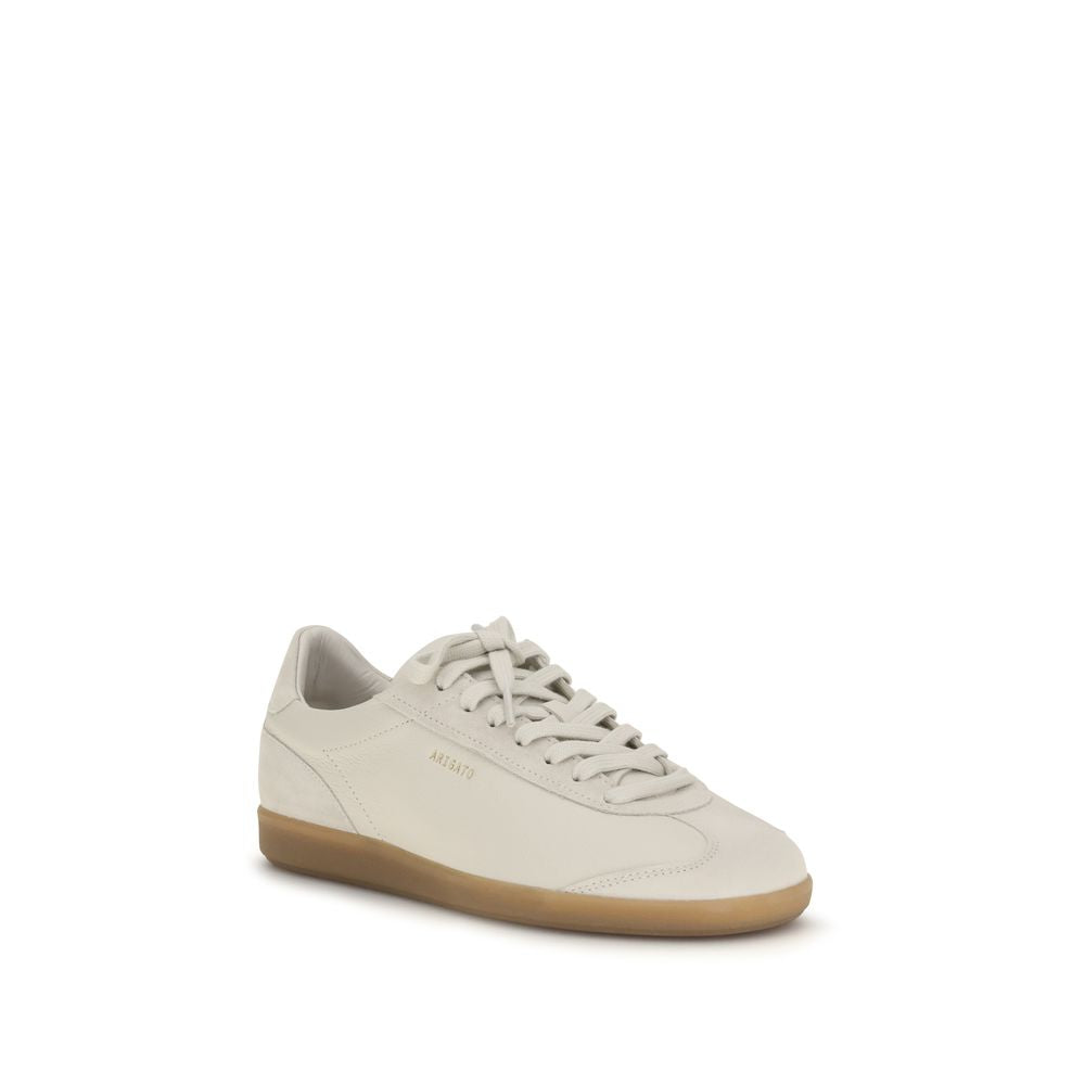 Sneakers by Axel Arigato for men in bos taurus calf suede leather beige & gold features an fashionable silhouette, showcasing the premium Men's Low Top Bos Taurus Calf Suede Leather Sneakers in a fashionable low-top style that offers a fashionable finish for refined style.