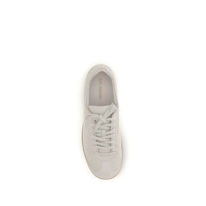 Sneakers by Axel Arigato for men in bos taurus calf suede leather beige & gold presents a on trend silhouette from the Men's Low Top Bos Taurus Calf Suede Leather Sneakers collection, showcasing a on trend low-top style for an elevated aesthetic.