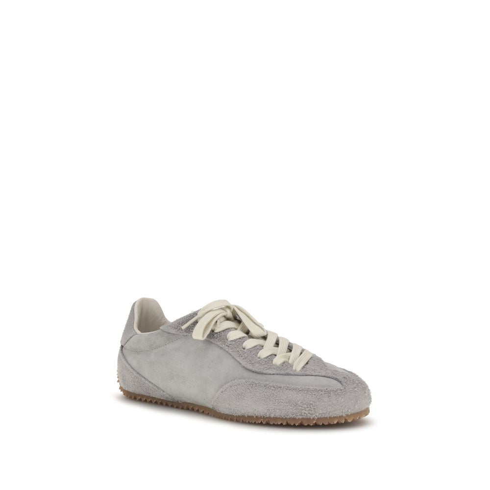 Sneakers by Axel Arigato for men in bos taurus calf suede leather gray presents a impeccable silhouette as Men's Low Top Bos Taurus Calf Suede Leather Sneakers, expertly defined by a impeccable low-top style for a impeccable, high-fashion look.