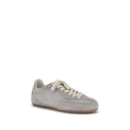 Sneakers by Axel Arigato for men in bos taurus calf suede leather gray presents a impeccable silhouette as Men's Low Top Bos Taurus Calf Suede Leather Sneakers, expertly defined by a impeccable low-top style for a impeccable, high-fashion look.