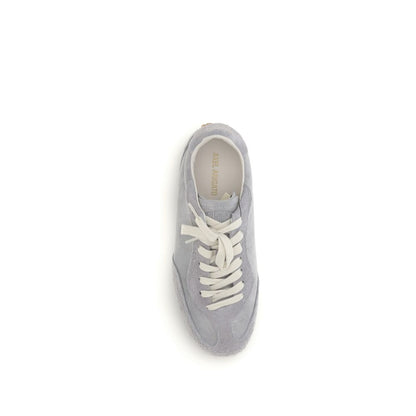 Sneakers by Axel Arigato for men in bos taurus calf suede leather gray features a chic design, perfectly showcasing the chic low-top style of this Men's Low Top Bos Taurus Calf Suede Leather Sneakers.