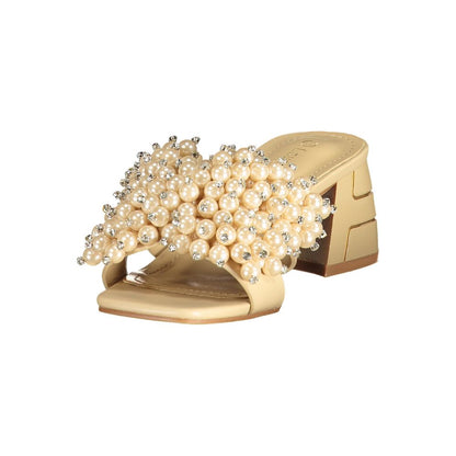 Mid-Heel Sandals by Laura Biagiotti for women in polyurethane & rhinestone beige & pearl features an architectural silhouette, showcasing the architectural Women's Polyurethane & Rhinestone Mid-Heel Sandals with a 5-cm-heel mid-heel and .