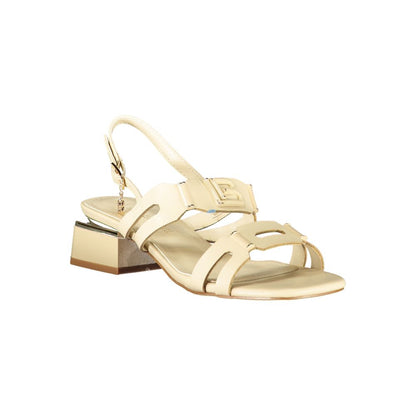Low-Heel Ankle Strap Sandals by Laura Biagiotti for women in polyethylene and beige presents a sculptural silhouette, showcasing the signature style of the Women's Polyethylene Low-Heel Ankle Strap Sandals with a sculptural 3-cm-heel low-heel and sculptural .