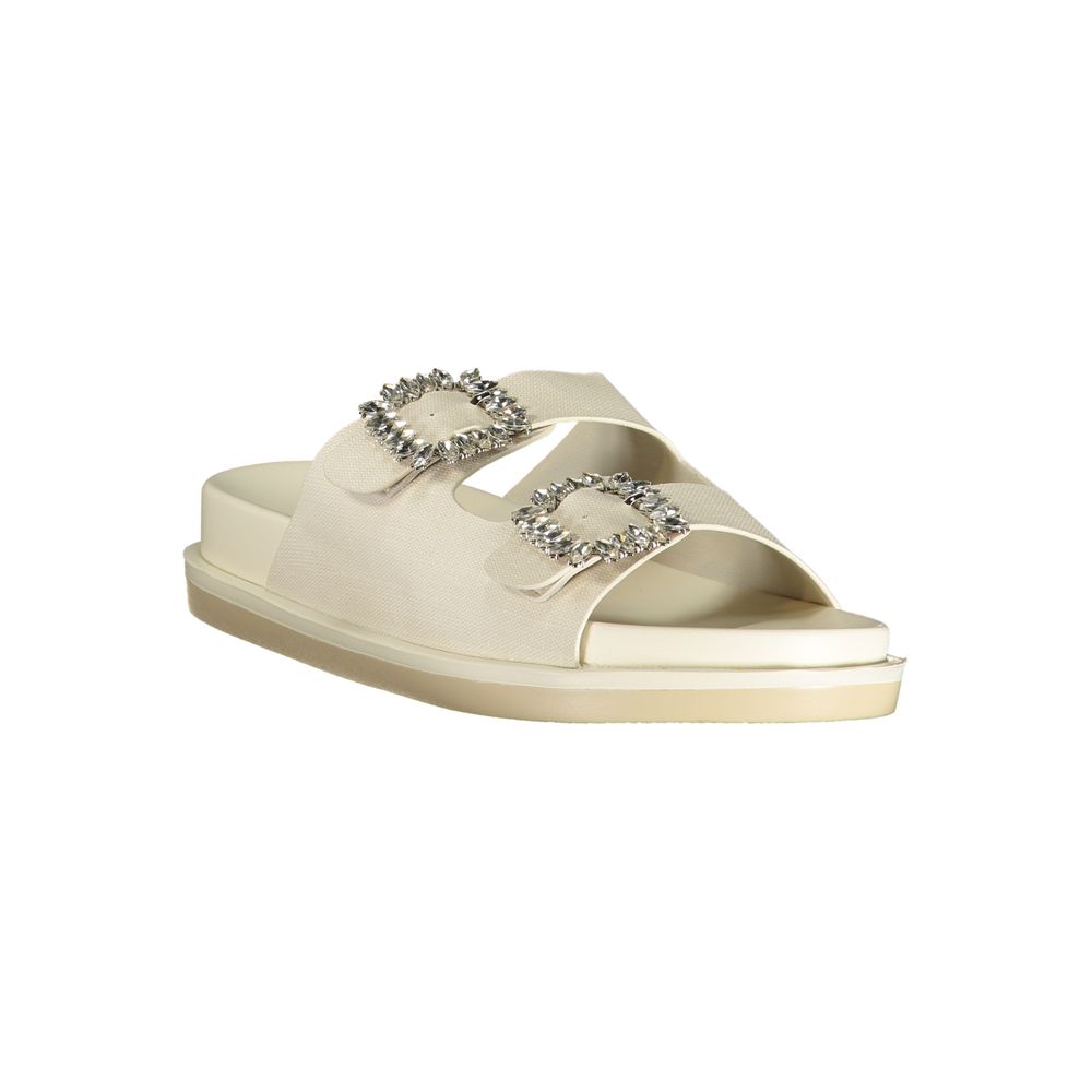 Flat Sandals by Laura Biagiotti for women in polyethylene & rhinestone white showcases a sculptural silhouette as Women's Polyethylene & Rhinestone Flat Sandals, defined by a sculptural flat and sculptural for a sculptural look.