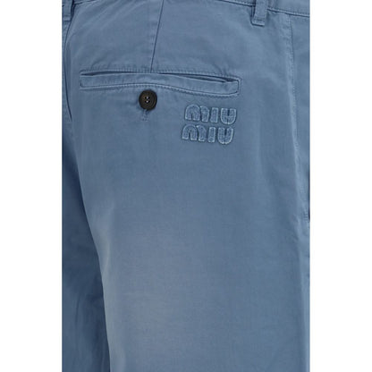 Casual Pants by Miu Miu for women in cotton blue presents a refined pantology silhouette, artfully defined by a refined pantology straight, regular-fit & wide, long, and a sophisticated mid rise.