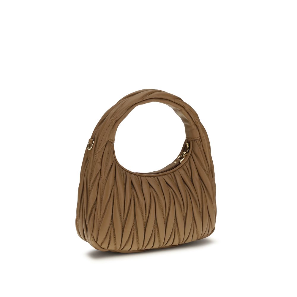 Quilted Hobo Shoulder Bag by Miu Miu for women in lamb leather beige, patterned, monogram & print showcases a enviable silhouette, artfully detailed with a secure zipper, organized single-compartment, and versatile shoulder-strap for a enviable look.