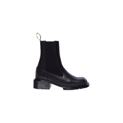 Ankle Chelsea Boots by Dr. Martens for women in leather black features an high-performance silhouette, showcasing the sophisticated design of the Women's Leather Ankle Chelsea Boots with a and a refined .