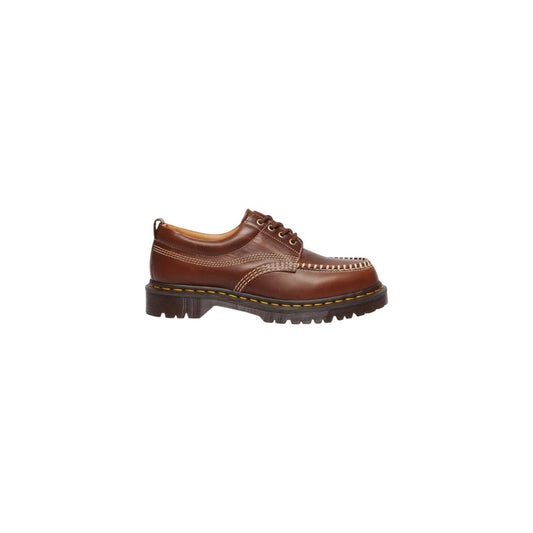Shoes by Dr. Martens for men in leather & rubber brown & yellow features an timeless silhouette from the Men's Leather & Rubber Shoes collection, defined by a timeless and for a timeless look.