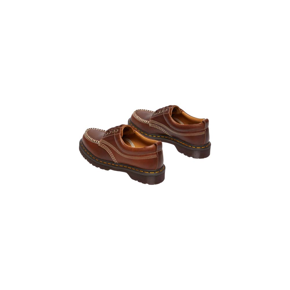 Shoes by Dr. Martens for men in leather & rubber brown & yellow showcases a timeless Men's Leather & Rubber Shoes aesthetic, defined by its timeless and elegant .