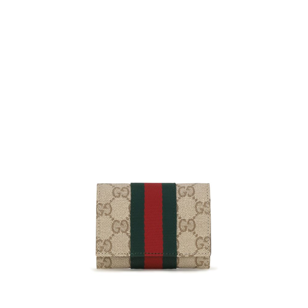 Cardholder Wallet by Gucci for women in fabric beige, gold, signature & striped showcases a enchanting silhouette, artfully detailed with the signature style of the Gg Fabric Cardholder Wallet and functional card-organization compact-design.