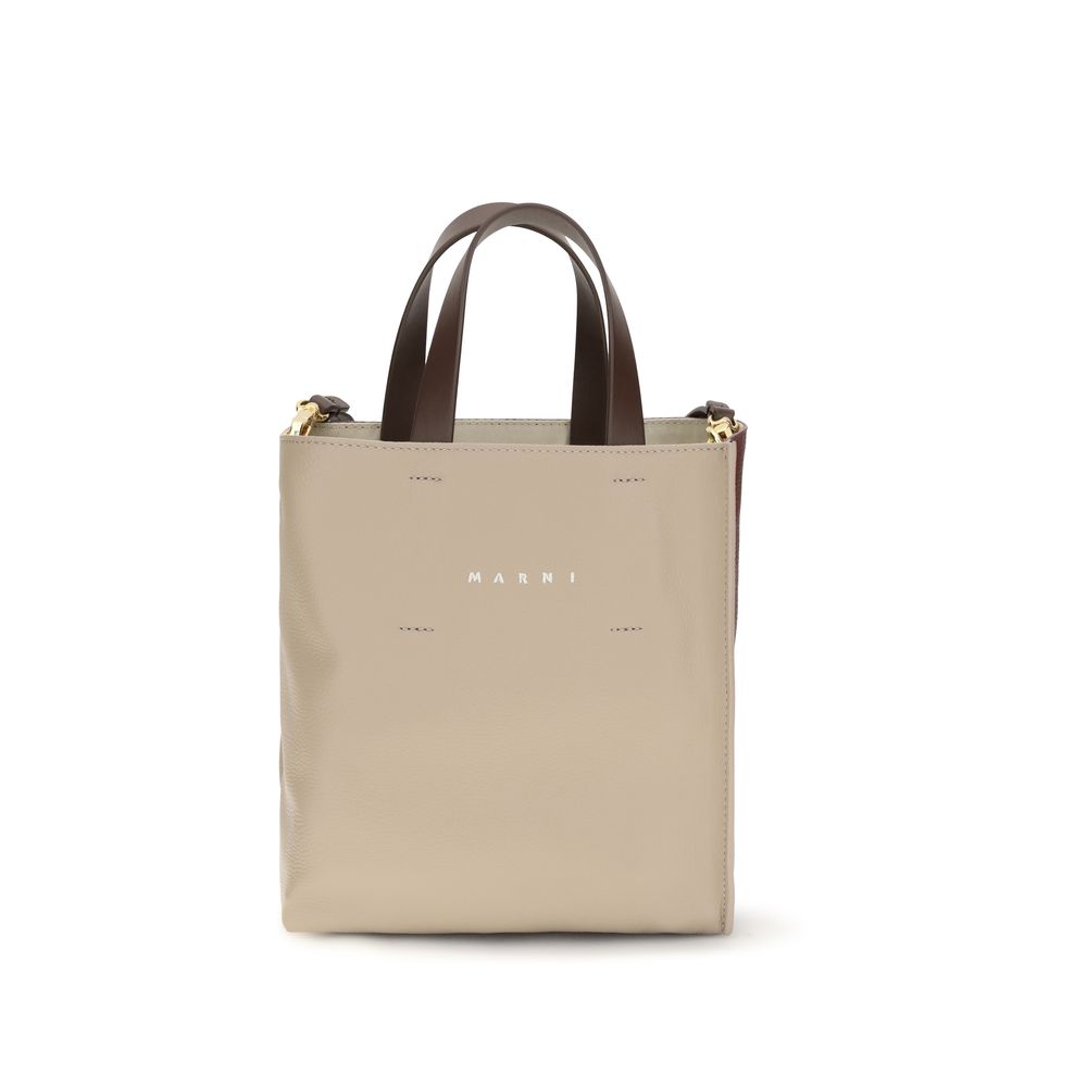Mini 2-in-1 Shoulder & Crossbody Bag by Marni for women in bos taurus calf leather beige presents a versatile silhouette, showcasing a secure zipper and versatile with versatile crossbody-strap, shoulder-strap, adjustable-strap & handle for a sophisticated look.